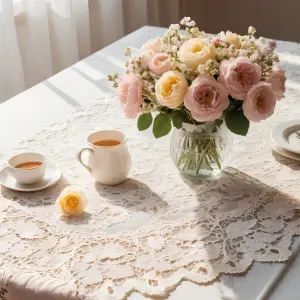 Elegant Tea Setting with Lace Tablecloth and Fresh Flower Bouquet