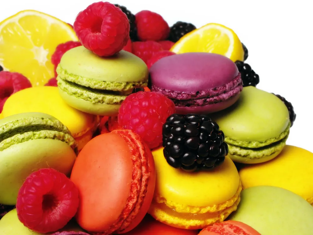 Colorful Macarons with Mixed Berries and Lemon Slices