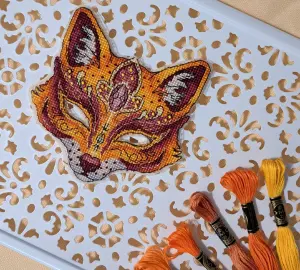 Embroidered Fox Mask with Colorful Threads on Decorative Tray