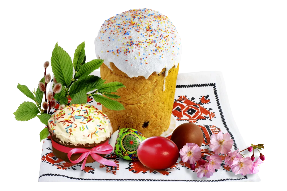 Traditional Easter Bread with Decorated Eggs and Spring Flowers