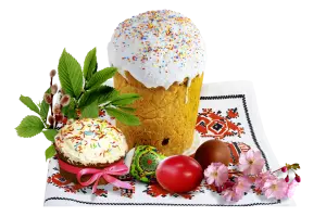 Traditional Easter Bread with Decorated Eggs and Spring Flowers