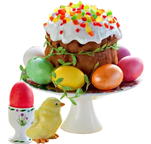 Easter Cake with Colored Eggs and Ceramic Chick Figurine