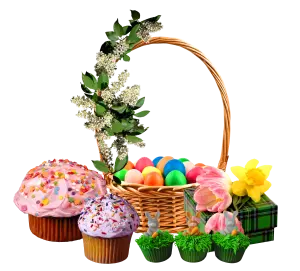 Easter Basket with Colored Eggs, Cupcakes, and Spring Flowers